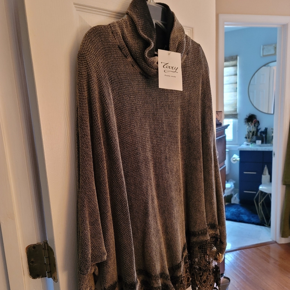 Terry Brand poncho with sleeves and detail at hem